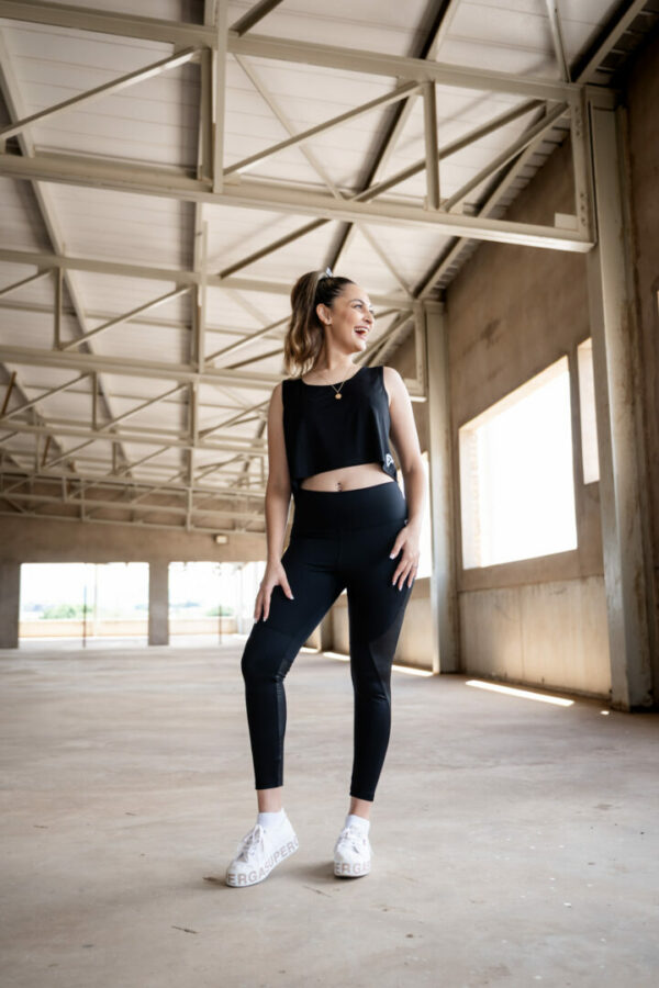 Noir Elite Flow Overvest in buttery-soft fabric, designed for comfort and style, with a flattering fit for casual wear and workouts.