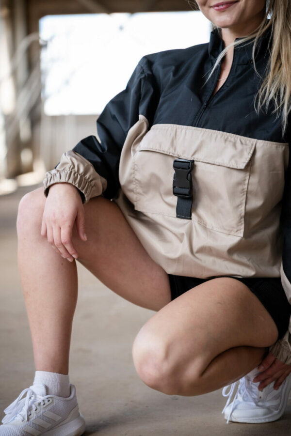 Dune Airlift Cargo Jacket in black and biscuit brown color block design with functional front pocket